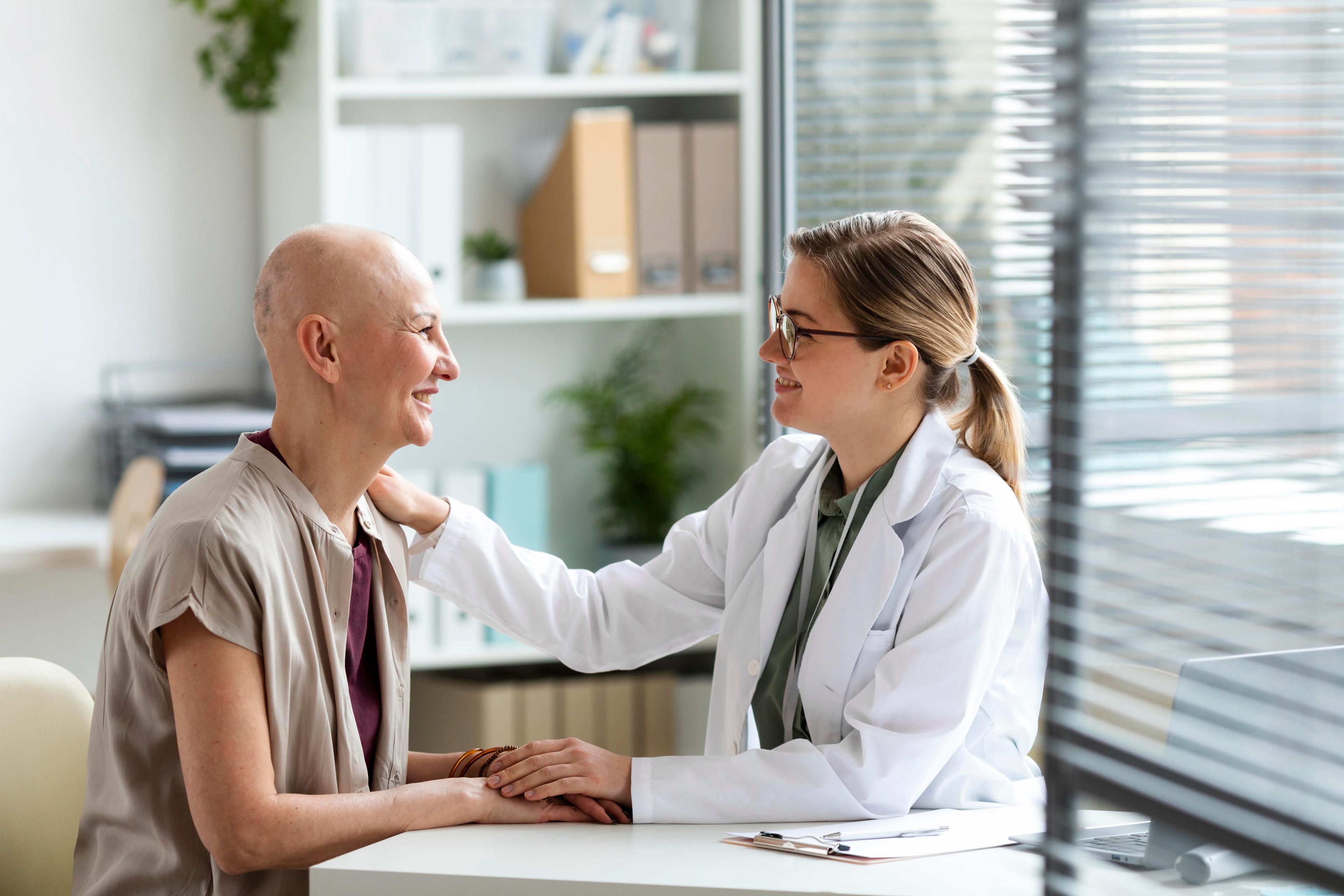 Doctor comforting a patient during a consultation